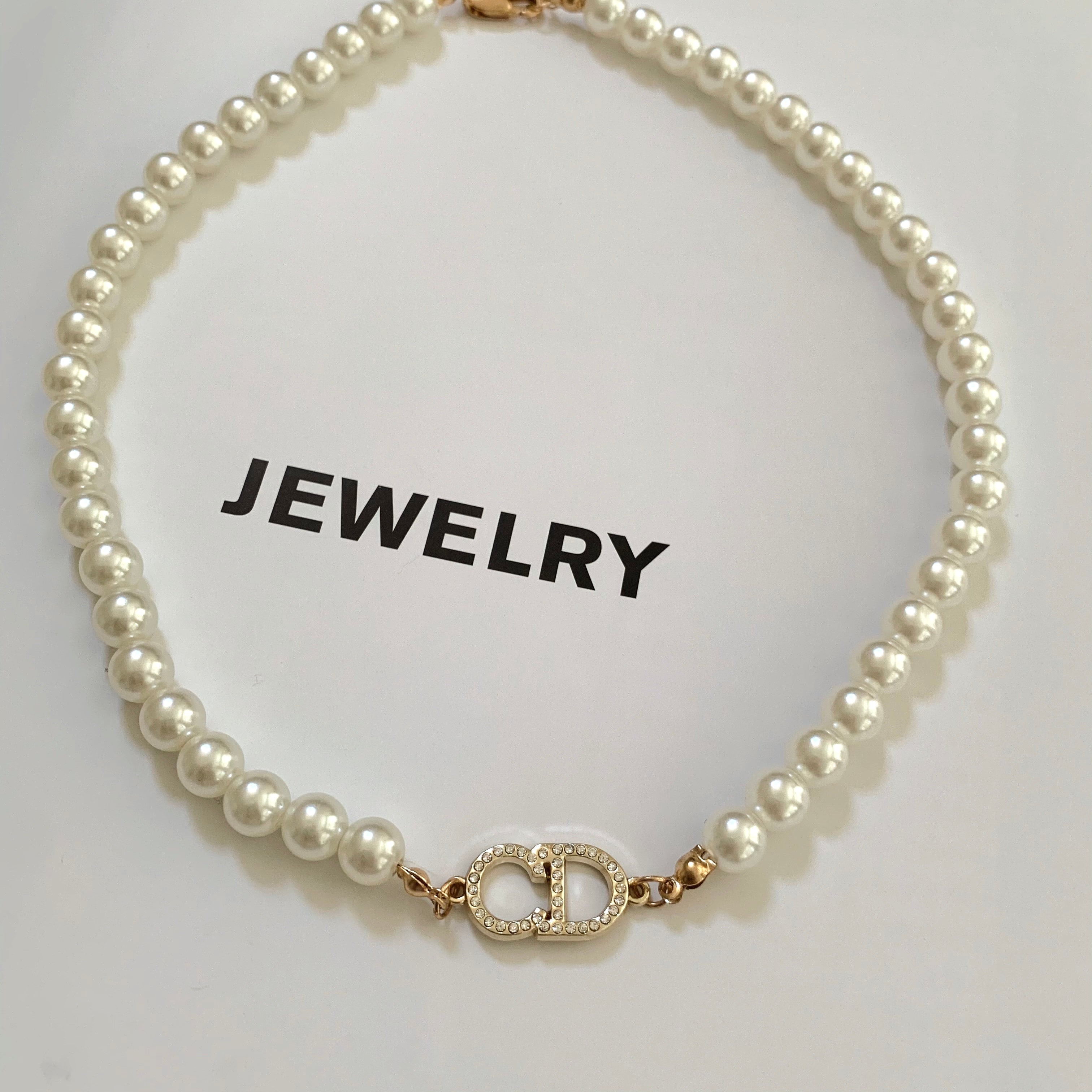 Petit CD Bracelet GoldFinish Metal with a White Resin Pearl  DIOR GR